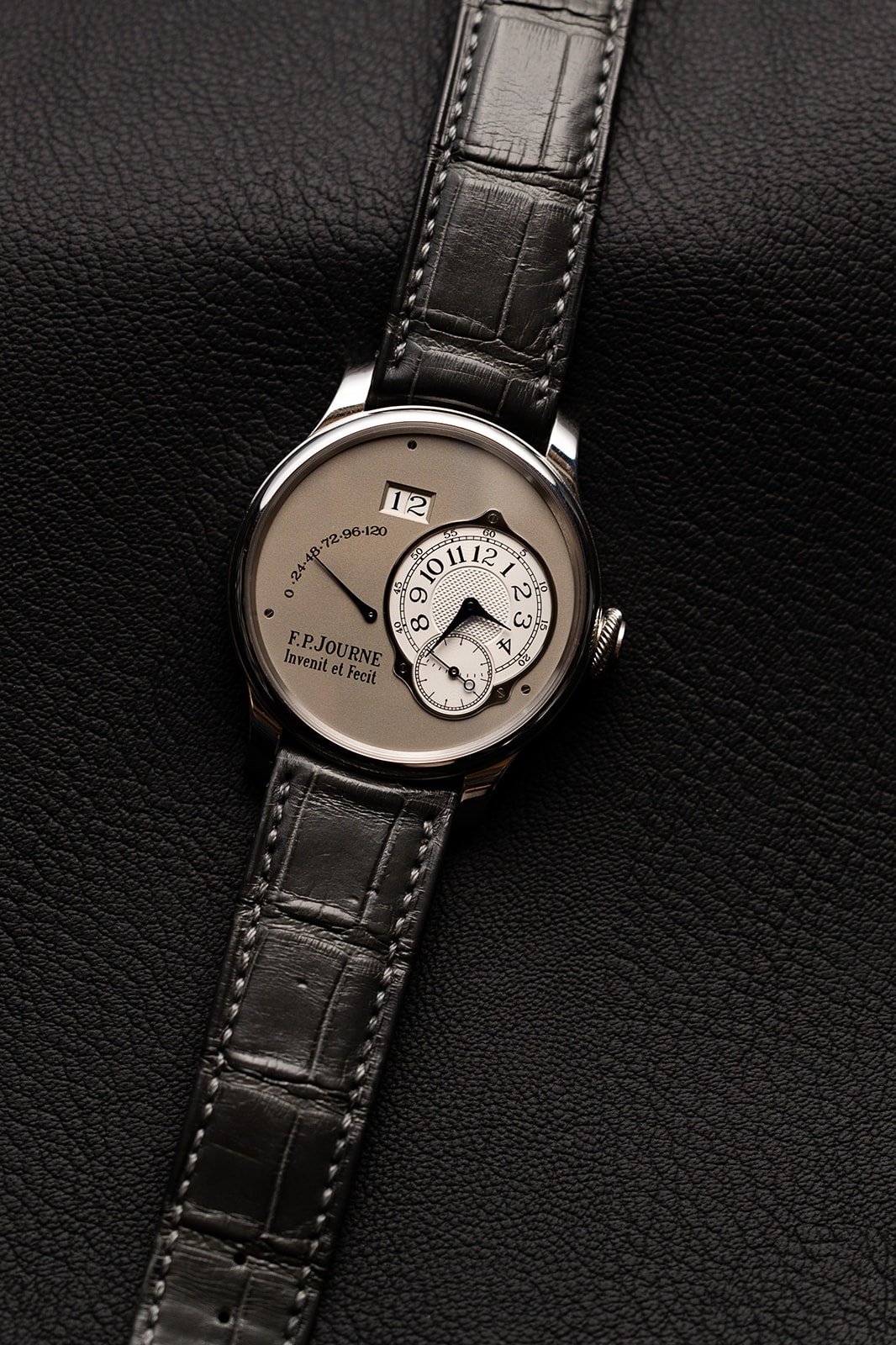 F.P. Journe watch with a black dial and leather strap