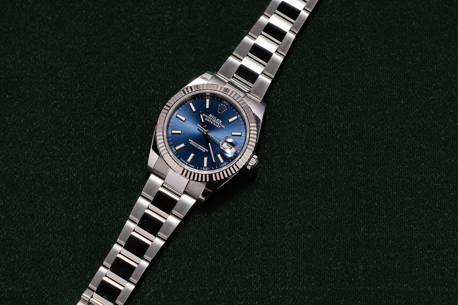 Rolex Datejust on dark green felt