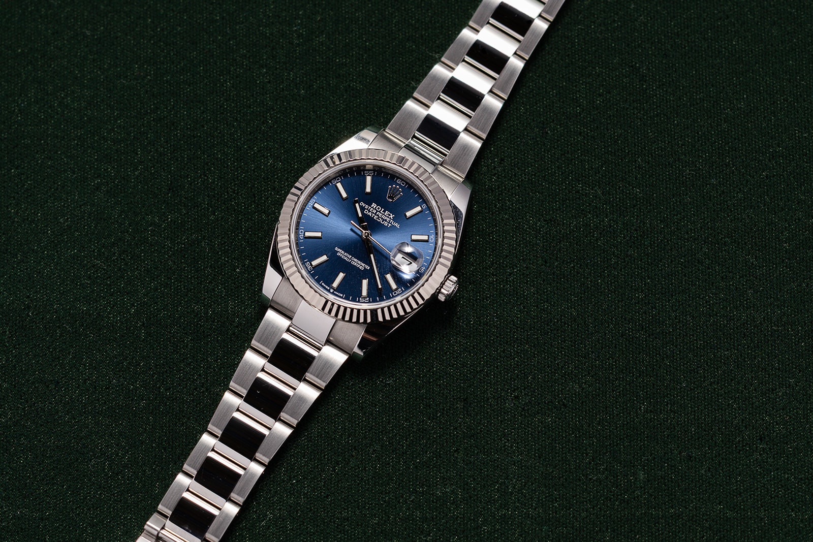 Rolex Datejust on dark green felt